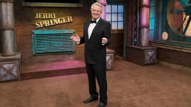 jerry springer The Jerry Springer Show on the set smiling in suit