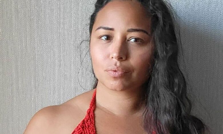 Tania Maduro from 90 Day Fiancé wearing a red dress makeup free