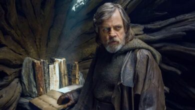Mark Hamill's Luke Skywalker stands in front of the sacred Jedi texts