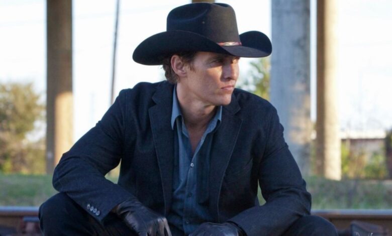 Matthew McConaughey sitting down in Killer Joe