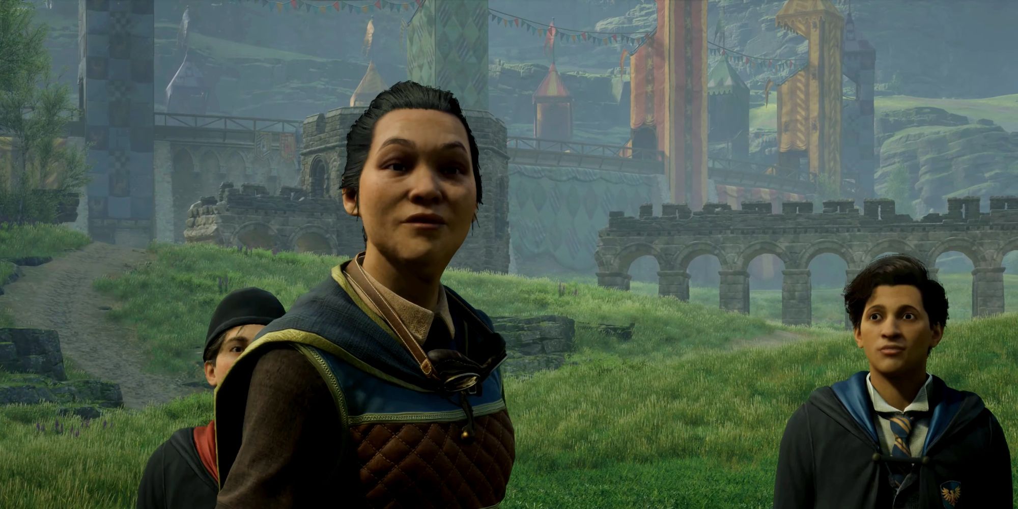 Hogwarts Legacy's Madame Kogawa addressing students during a flying class, with the Quidditch pitch in the background.