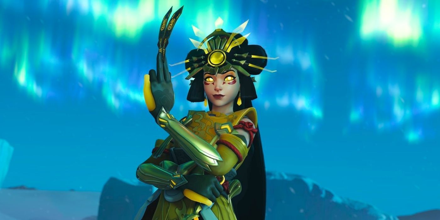 Overwatch 2 Kiriko wearing her mythic skin and holding up her healing ofuda on the Antarctic Peninsula map.