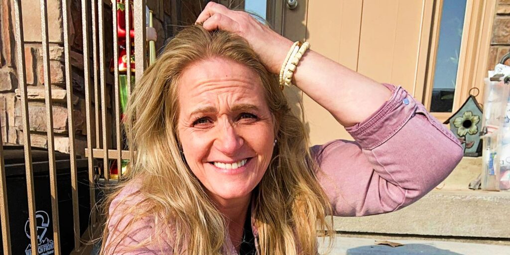 Sister Wives Christine Brown smiling outside