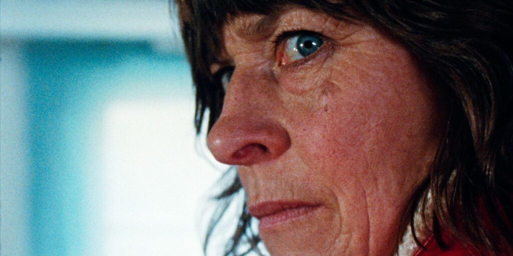 Mary Woodvine looks over her shoulder in Enys Men