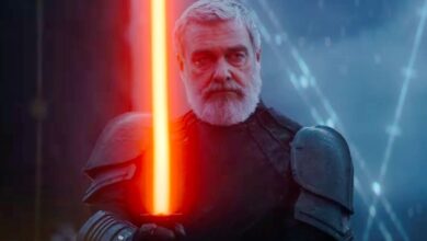 Ray Stevenson holding a lightsaber in Ahsoka.