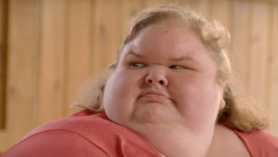 Tammy Slaton from 1000-Lb Sisters wearing orange shirt looking to the side