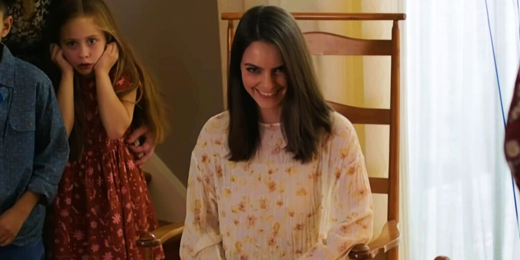 Someone smiling very creepily in Smile