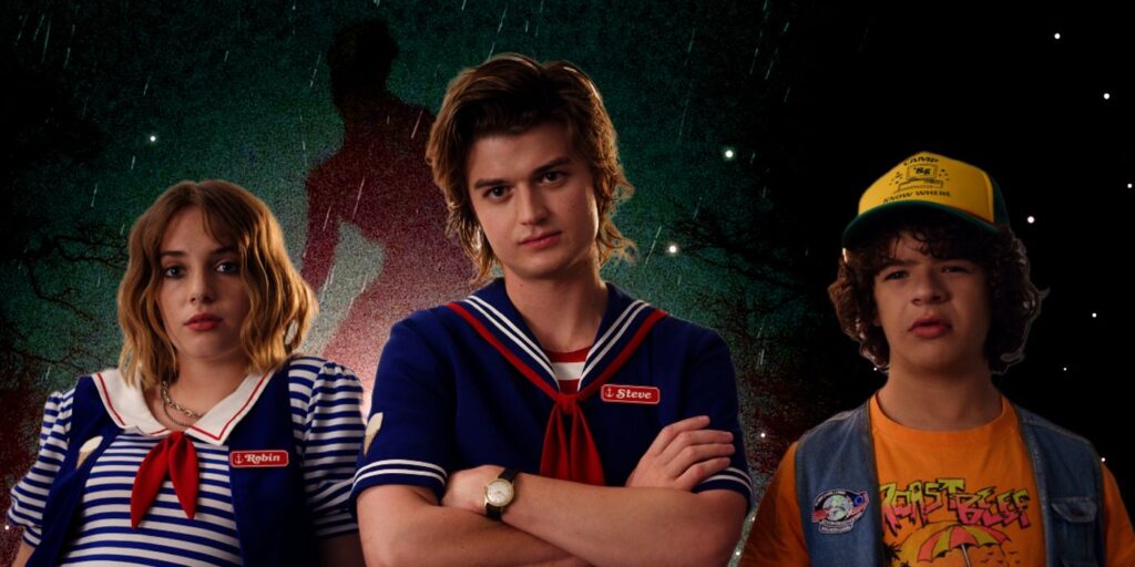Maya Hawke Joe Keery and Gaten Matarazzo in Front of Stranger Things Backdrop