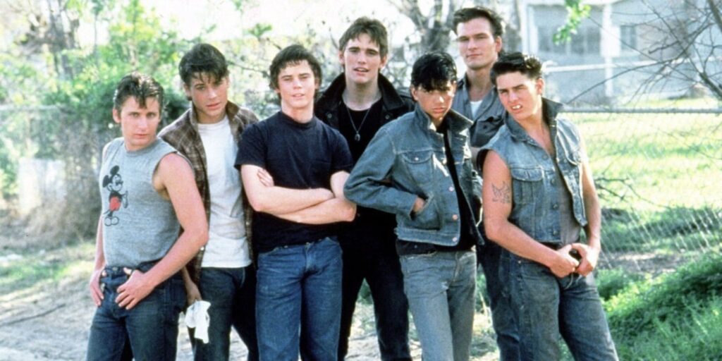 The cast of the Outsiders pose for a promo image