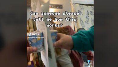 A screenshot showing showing a container of gum and piece of paper held against a mirror