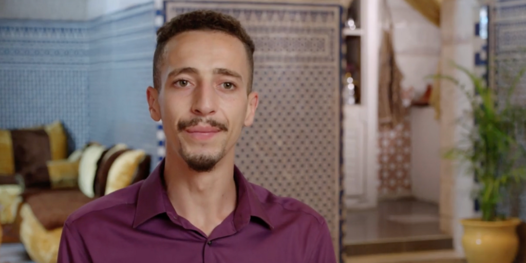 Oussama From 90 Day Fiancé: The Other Way wearing burgundy shirt