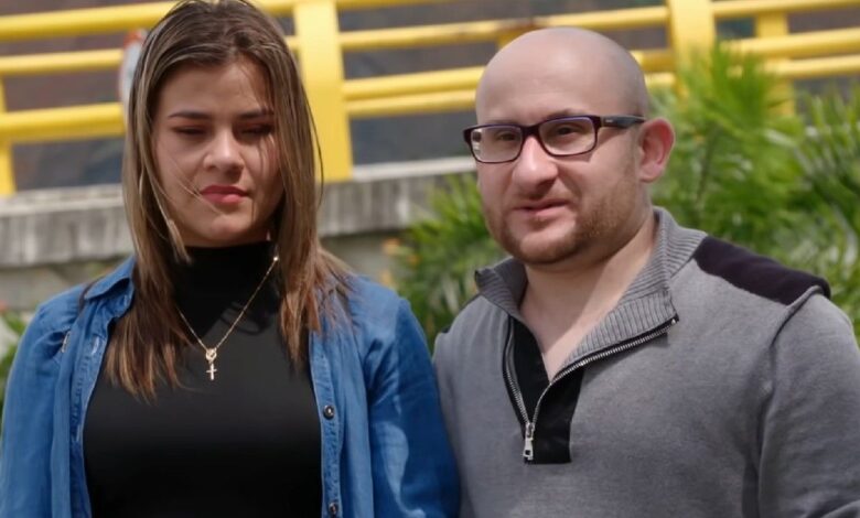 90 Day Fiance Mike and Ximena posing outside smiling slightly