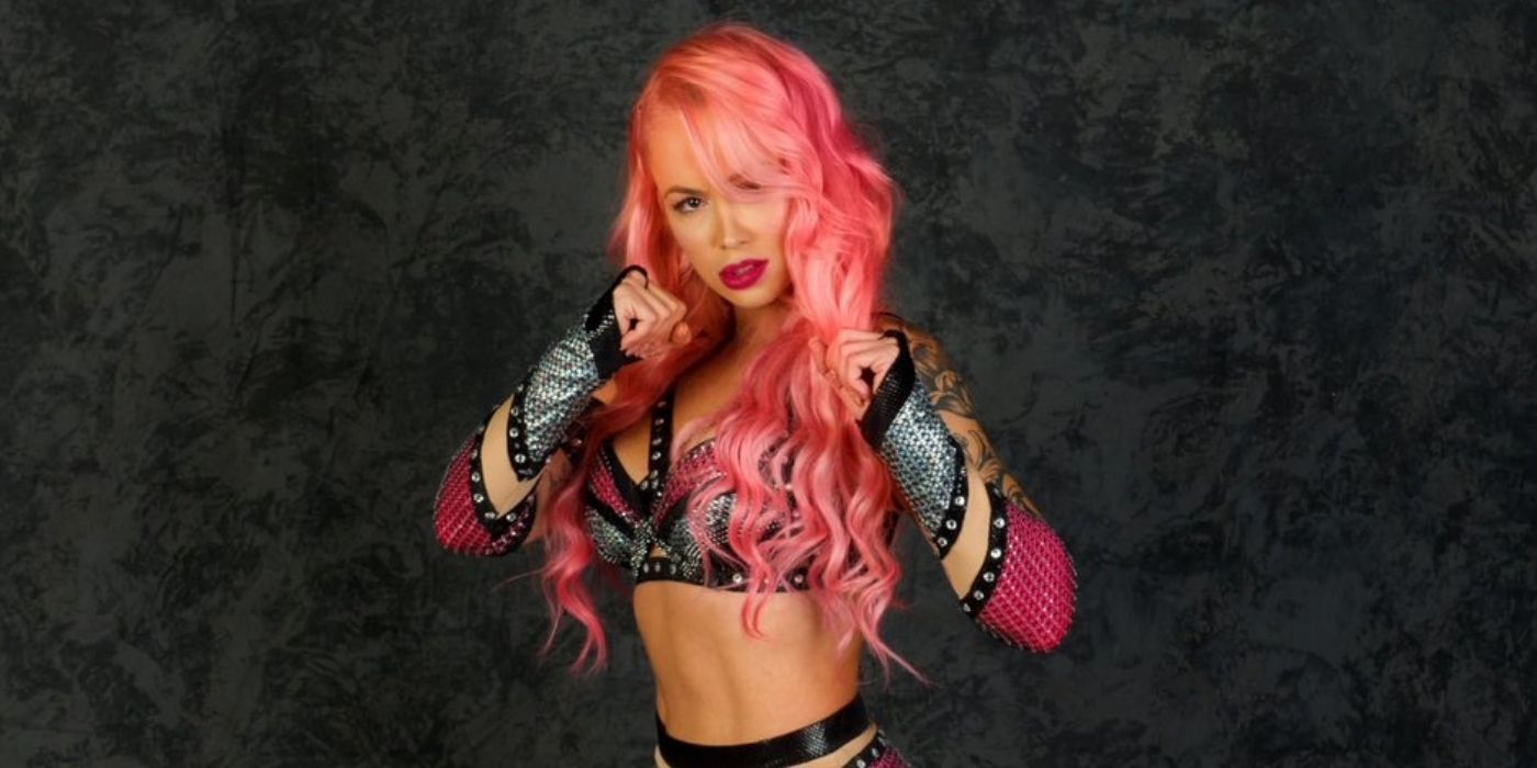 Paola Mayfield from 90 Day Fiance in a wrestling pose