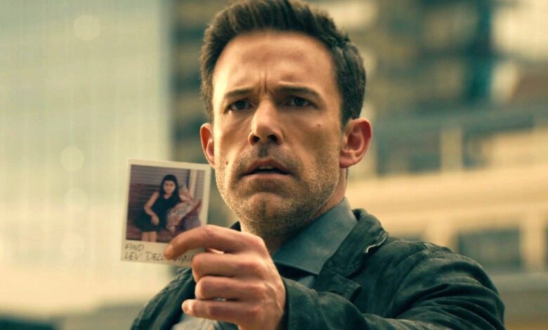 Ben Affleck as a detective holding up a picture of his missing daughter in Hypnotic