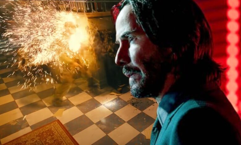 Custom image of Keanu Reeves and a man being hit with a Dragon's Breath round in John Wick: Chapter 4.