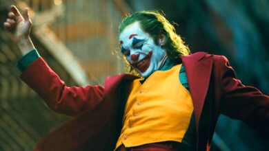 Joaquin Phoenix as Arthur Fleck Dancing Down Stairs In Joker