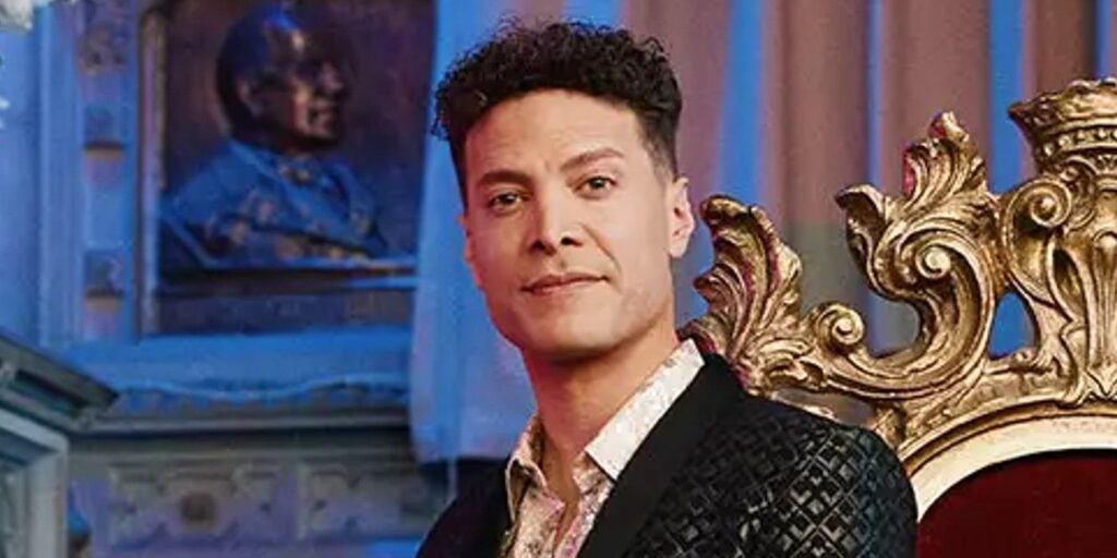 Justin Guarini Once Upon A One More Time posing in suit