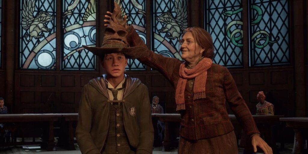 Hogwarts Legacy student having the sorting hat placed on him by a teacher.