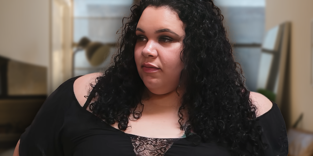 ashley barnard 600 lb life looking to side in dark outfit long hair