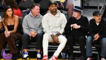 Maverick Carter attends a playoff basketball game.