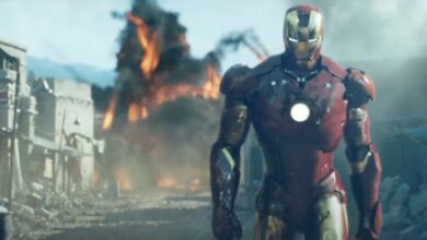 Iron Man walking away from an explosion