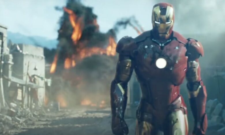 Iron Man walking away from an explosion