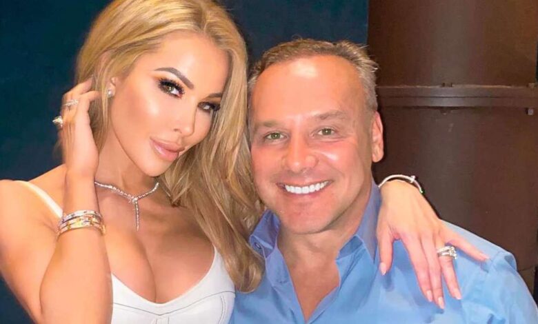 RHOM's Lisa Hochstein with her arm wrapped around Lenny Hochstein