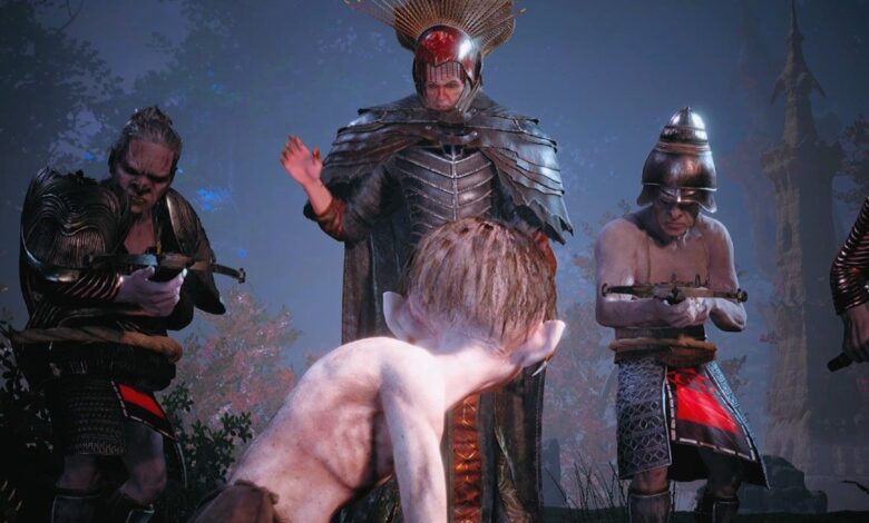 Gollum standing in front of the Mouth of the Sauron and three henchmen.