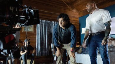 Knock At The Cabin BTS image showing Dave Bautista and M. Night Shyamalan.