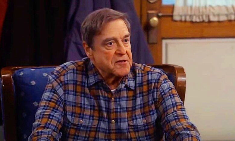 Dan (John Goodman) sitting down in The Conners season 5 episode 21