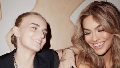 Selling Sunset's Chrishell Stause and her partner G Flip smiling