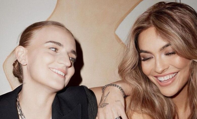 Selling Sunset's Chrishell Stause and her partner G Flip smiling
