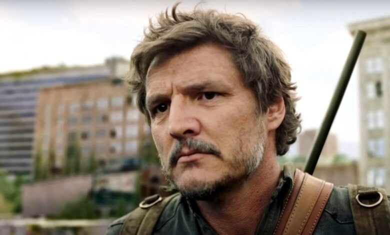Joel looking at the city in The Last of Us