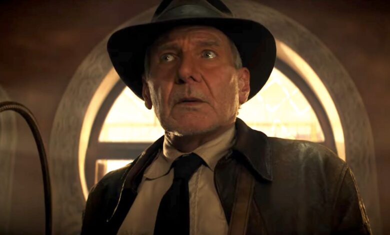 Harrison Ford as Indiana Jones holding his whip in Indiana Jones and the Dial of Destiny