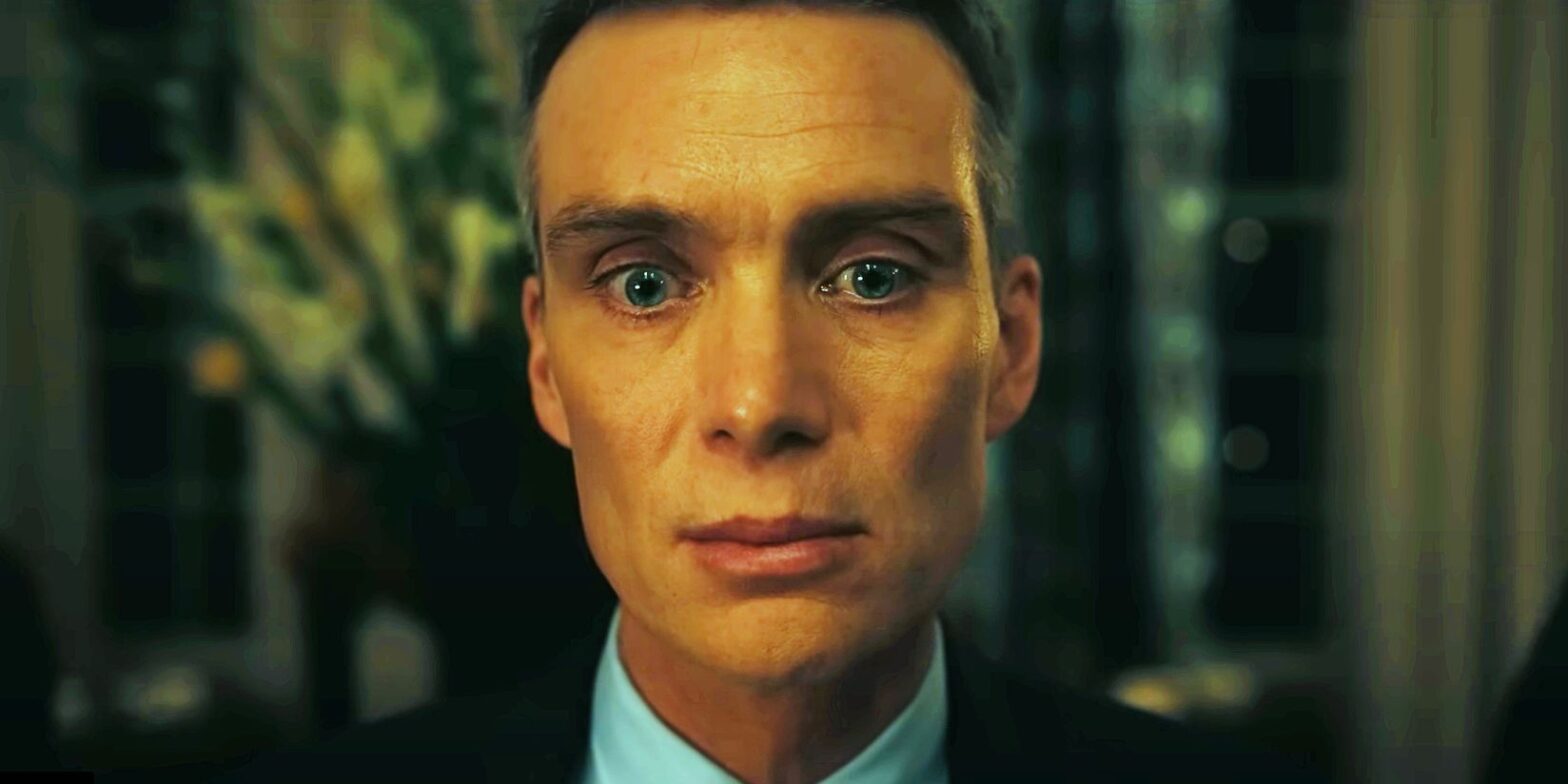 Cillian Murphy as Robert Oppenheimer staring straight ahead and looking worried in Oppenheimer