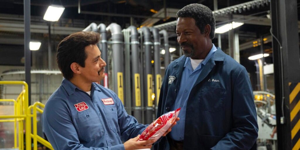 Jesse Garcia as Richard Montañez and Dennis Haysbert as Clarence C. Baker in Flamin' Hot