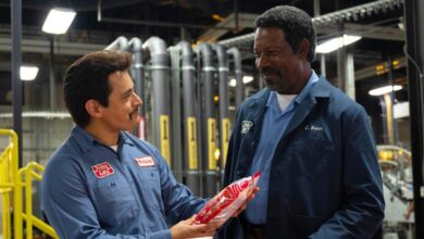 Jesse Garcia as Richard Montañez and Dennis Haysbert as Clarence C. Baker in Flamin' Hot