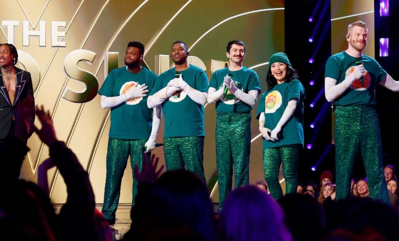 Nick Cannon unmasking Pentatonix on Masked Singer