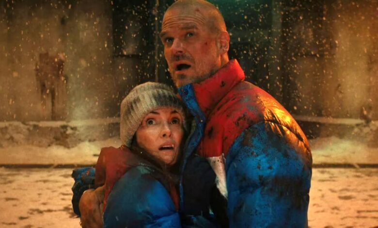 Hopper and Joyce holding each other in Stranger Things season 4