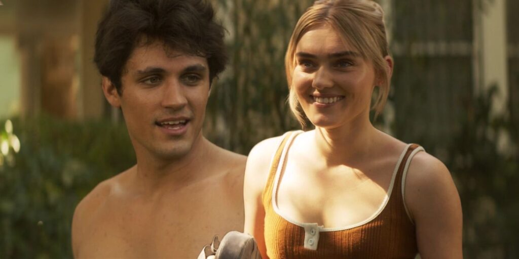 Meg Donnelly as Mary Campbell and Drake Rodger as John Winchester Relaxing and Smiling in The Winchesters