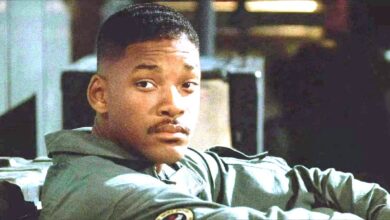 Will Smith In Independence Day in a pilots jumpsuit looking slightly sad