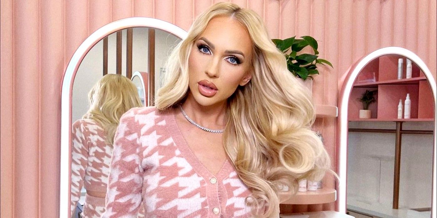 Selling Sunset star Christine Quinn posing in pink outfit