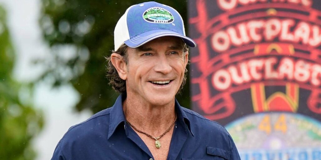 Jeff Probst Survivor 44 smiling outside in survivor hat