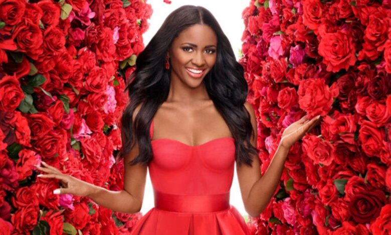 The Bachelorette's Charity Lawson in red dress in front of roses