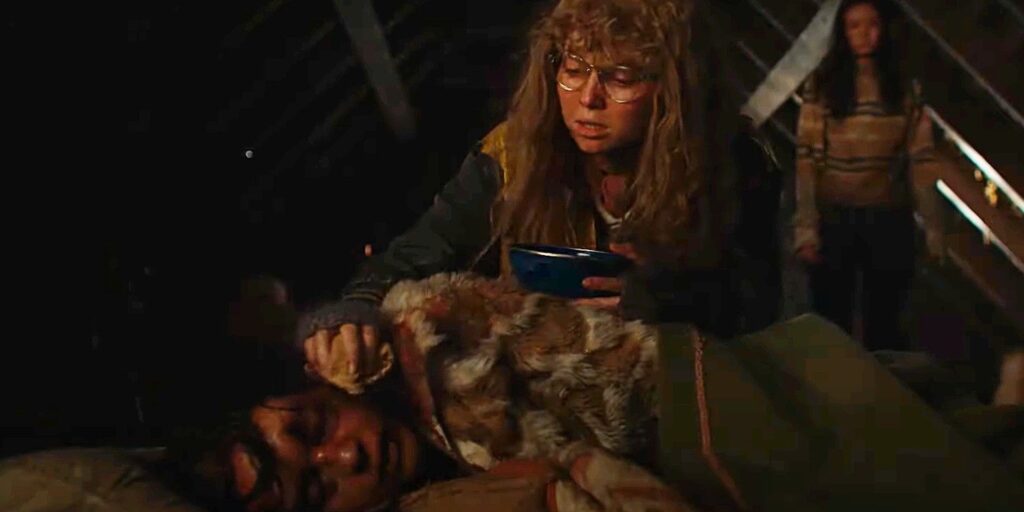 young Misty tending to young Lottie in Yellowjackets season 2 episode 8