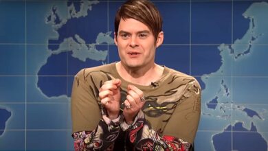 Bill Hader as Stefon on Saturday Night Live looking nervous against the backdrop of a world map