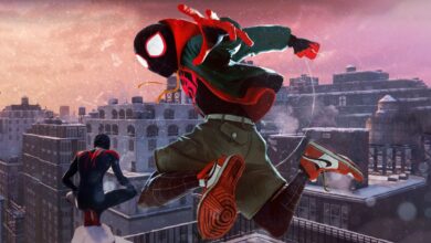 Insomniac's Miles Morales looks out over a snow-covered Manhattan, as Into The Spider-Verse's Miles Morales does a dynamic leaping pose in the middle of the screen