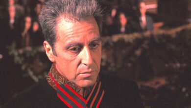 Al Pacino As Michael Corleone In The Godfather Part 3 looking somber during a ceremonial occasion in a church