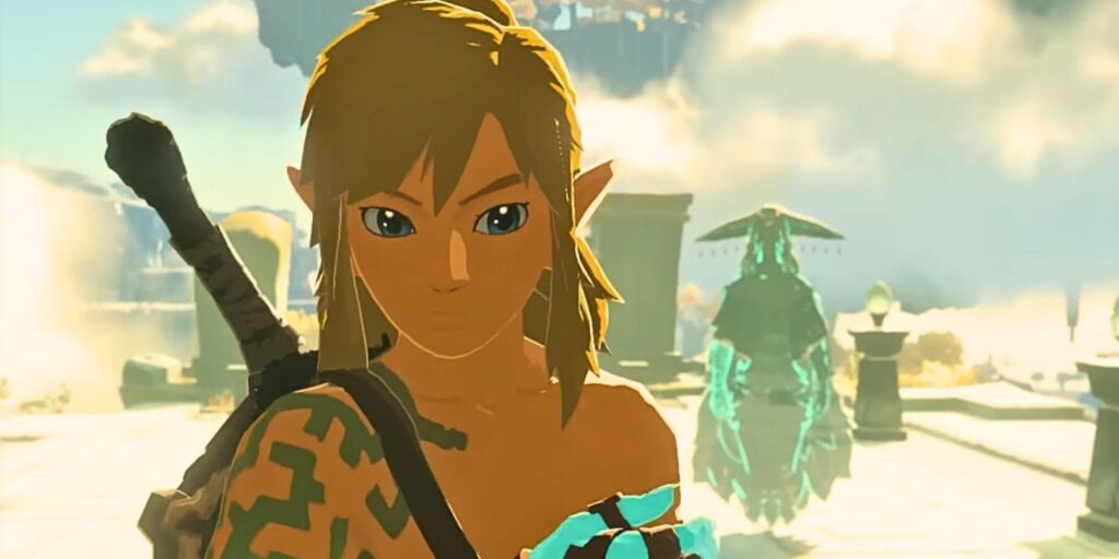 A close-up of Link looking concerned as the ghost of Rauru floats in the background behind him in Tears of the Kindgom.