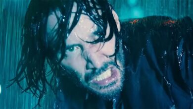Keanu Reeves angry while fighting in water in John Wick Chapter 4
